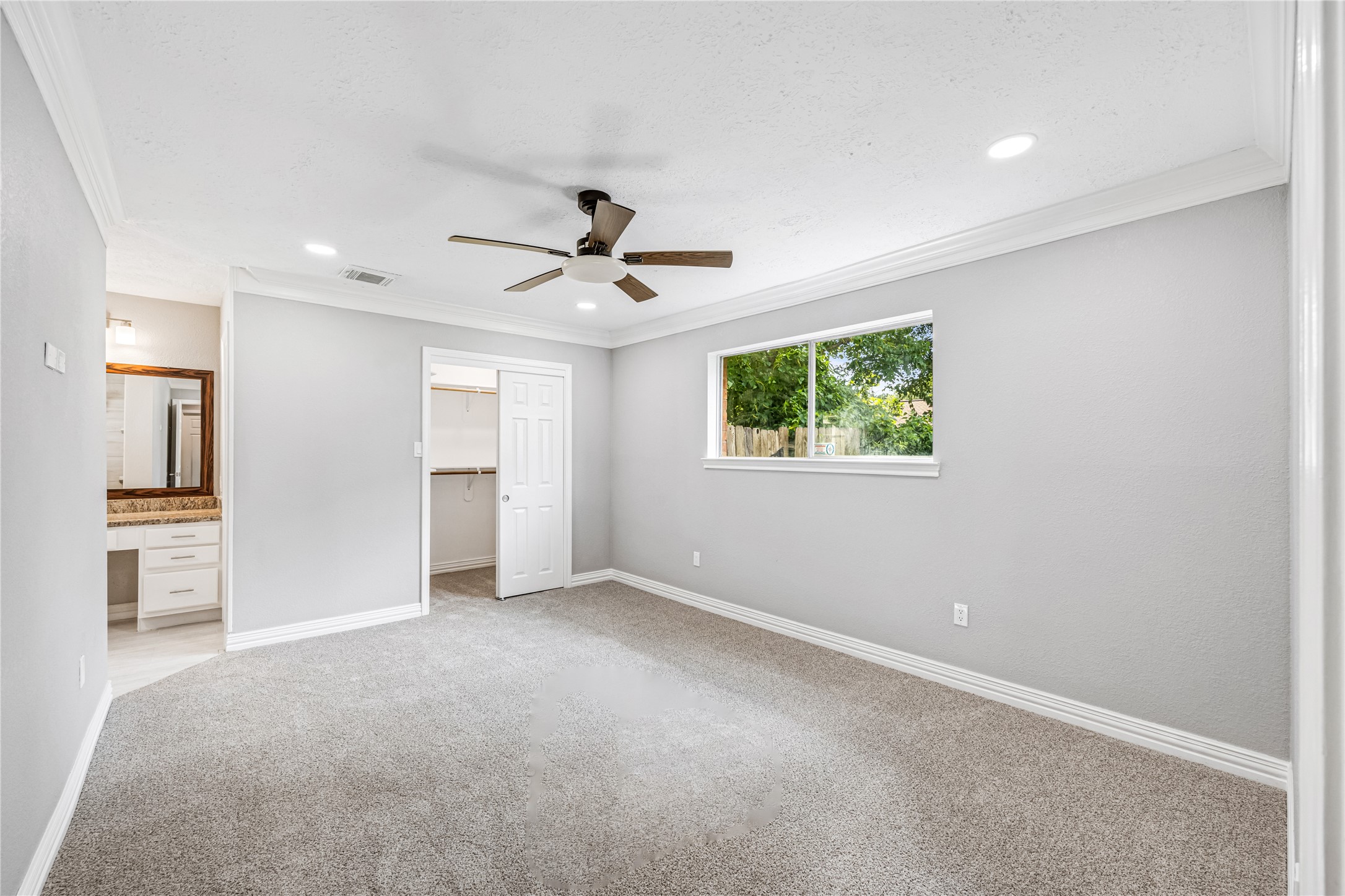 9806 Tanager Lane Conroe, TX 77385 - Photo 21 of 28 a view of an empty room with a window
