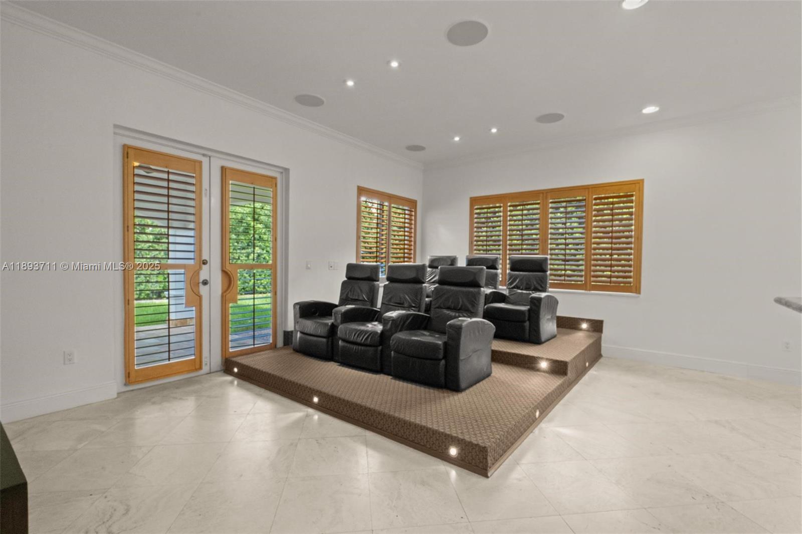 16763 Northwest 77th Path Miami Lakes, FL 33016 - Photo 20 of 53 a living room with furniture and a window