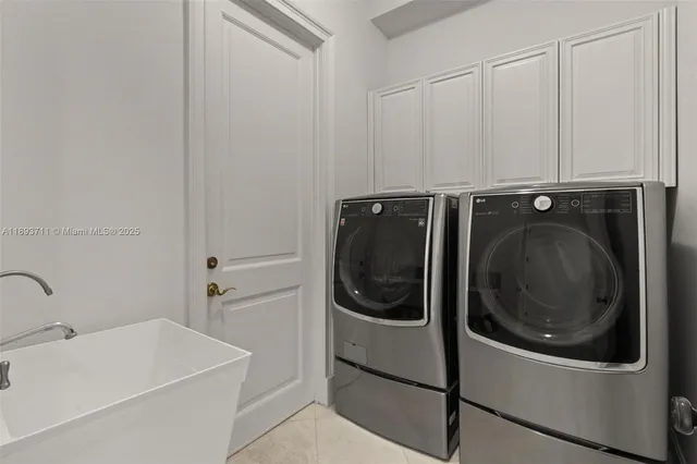 a bedroom with a bed table and a window