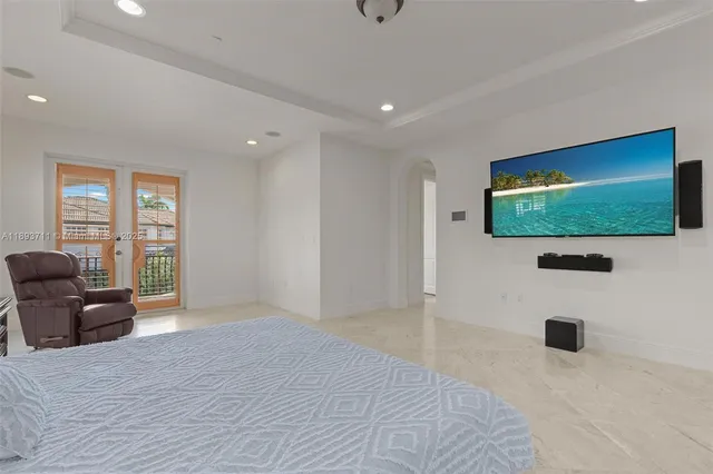 a bathroom with a double vanity sink mirror and window