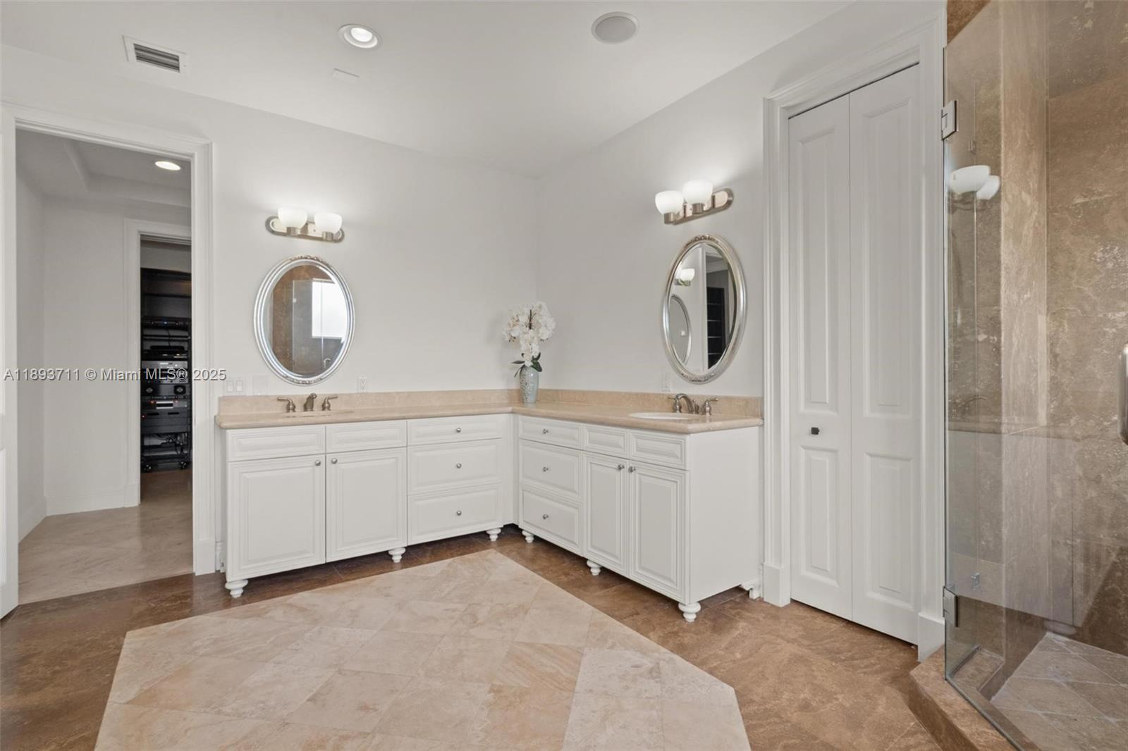 16763 Northwest 77th Path Miami Lakes, FL 33016 - Photo 37 of 53 a bathroom with a double vanity sink mirror and window