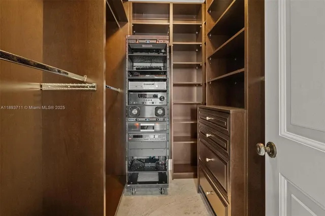 a bedroom with a bed and closet