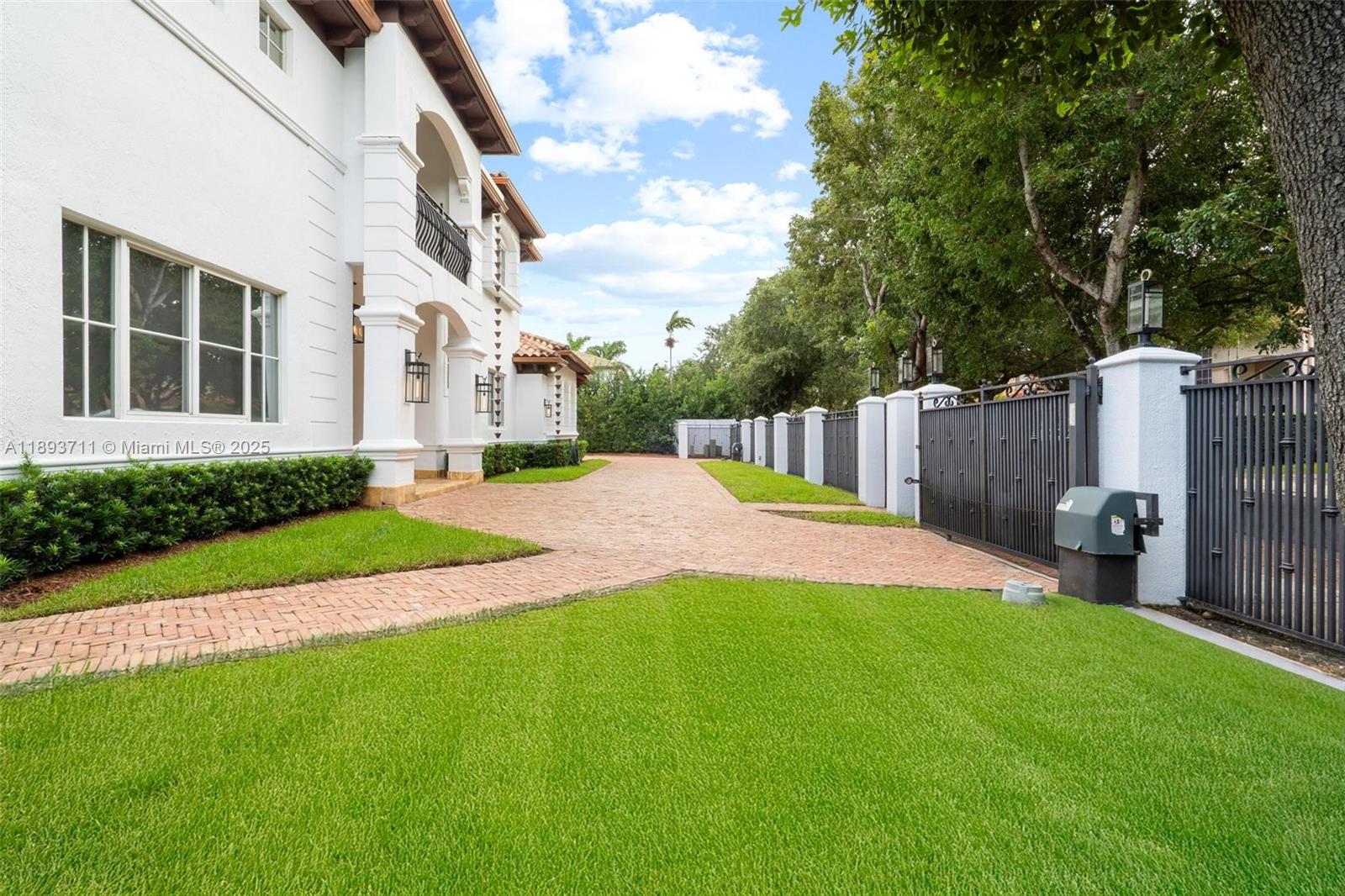 16763 Northwest 77th Path Miami Lakes, FL 33016 - Photo 4 of 53 a view of a house with a yard and pathway
