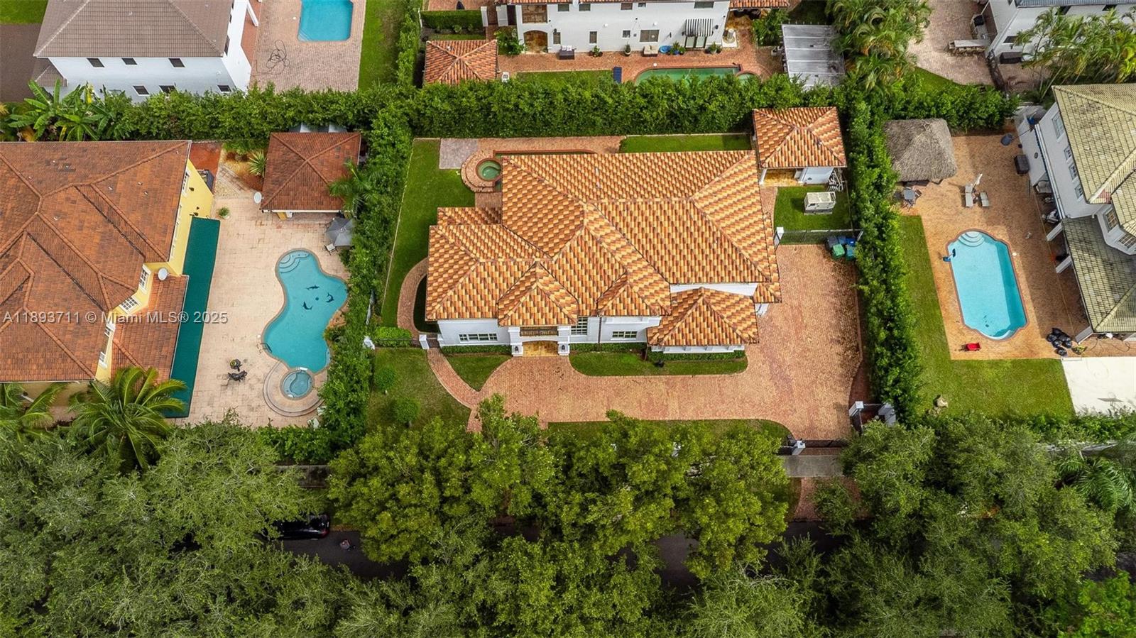 16763 Northwest 77th Path Miami Lakes, FL 33016 - Photo 45 of 53 an aerial view of a house with outdoor space and tennis court