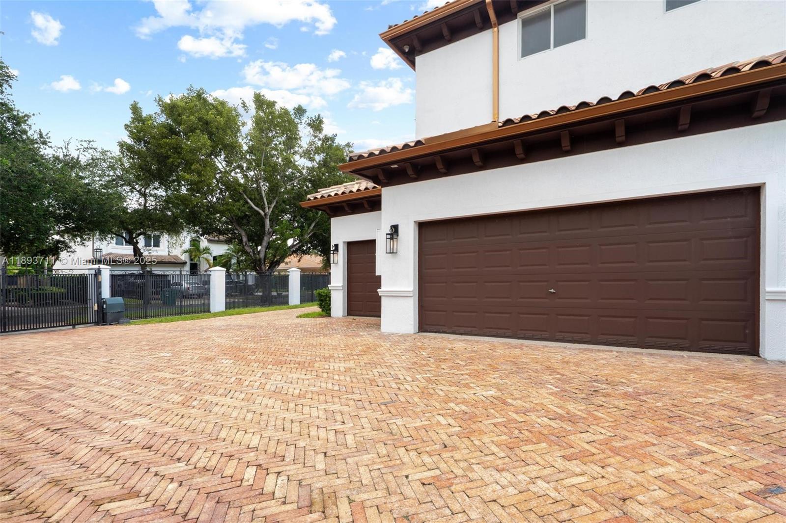 16763 Northwest 77th Path Miami Lakes, FL 33016 - Photo 6 of 53 a front view of a house with a yard