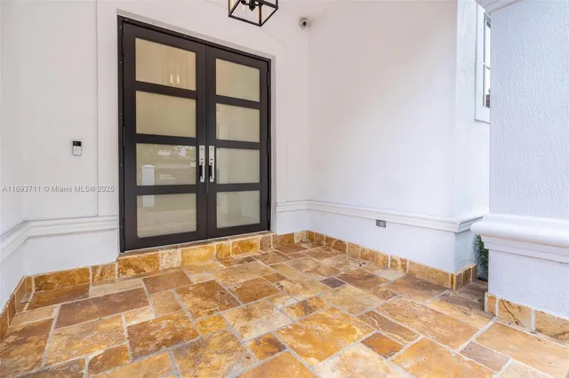 a view of a swimming pool with a yard