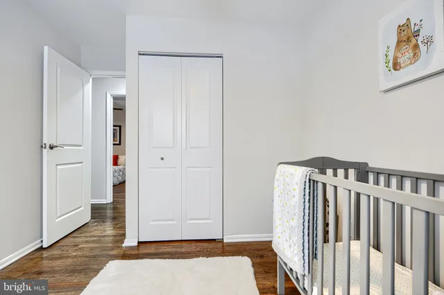a bathroom with a shower curtain and a sink