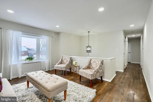 a living room with furniture and a couch