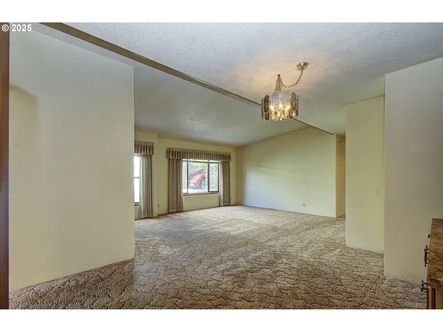 a bathroom with a tub sink and a mirror