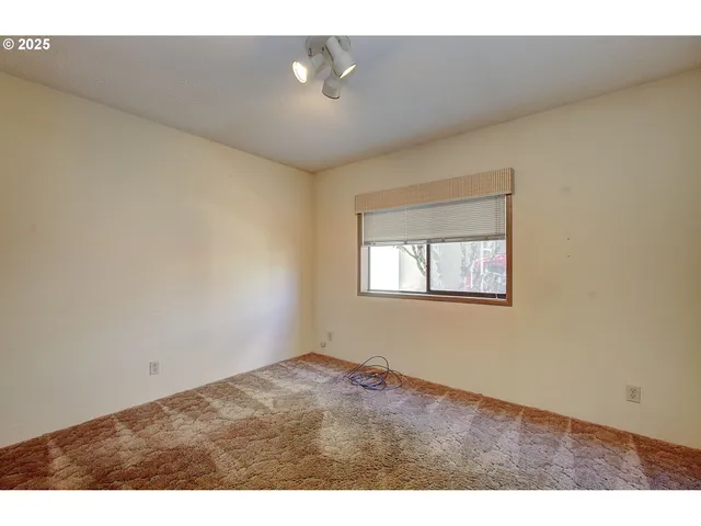 a view of a street with sign board