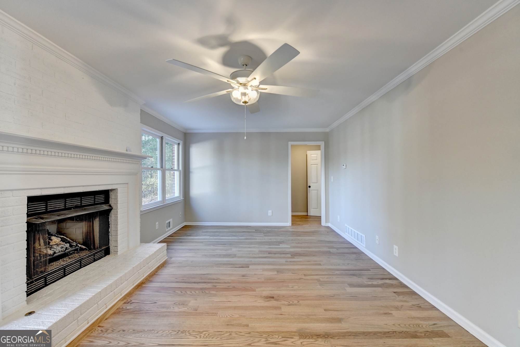 590 Manning Gin Road Monroe, GA 30656 - Photo 25 of 76 a view of an empty room with fire place and a fireplace