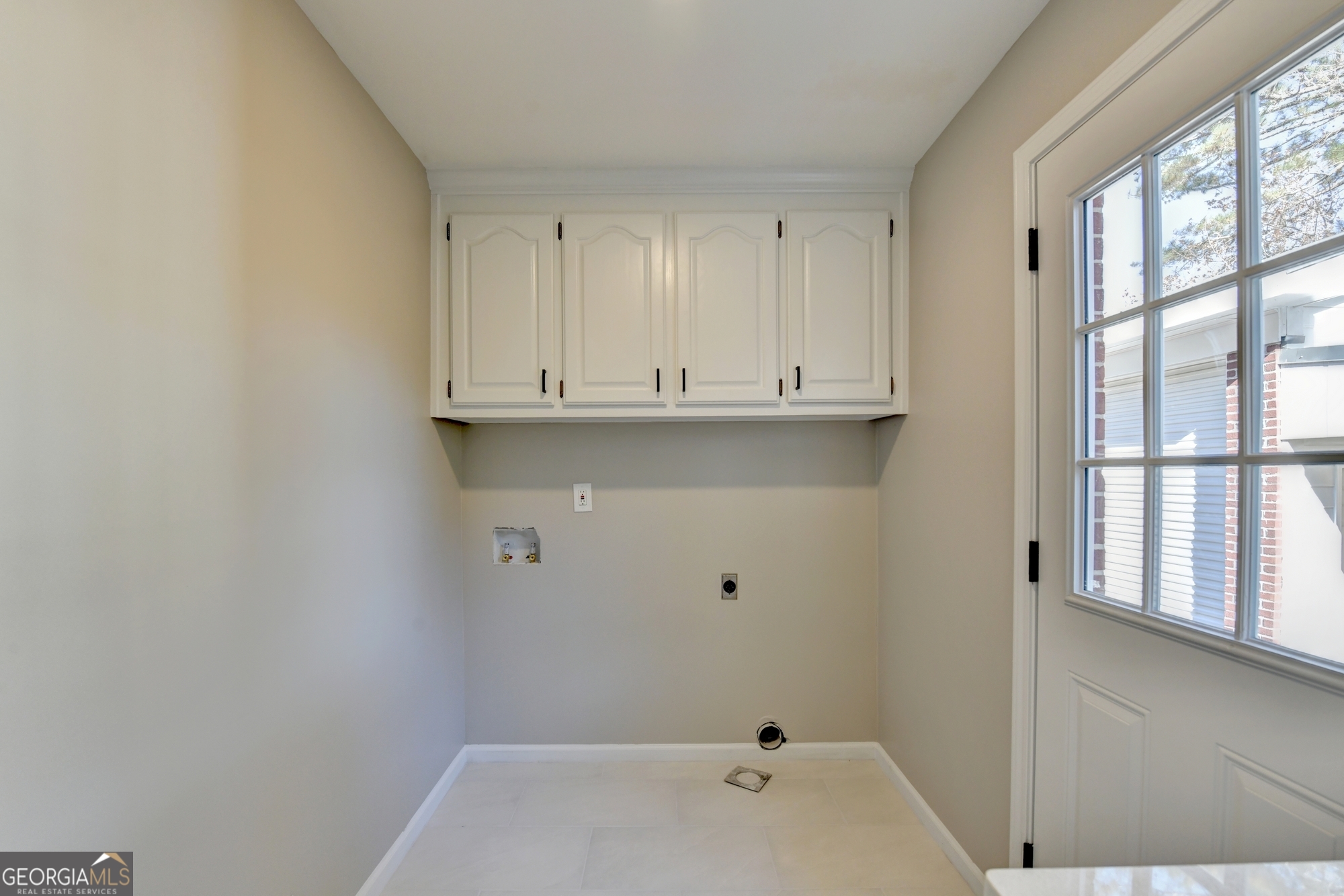 590 Manning Gin Road Monroe, GA 30656 - Photo 40 of 76 a bathroom with a sink and cabinets