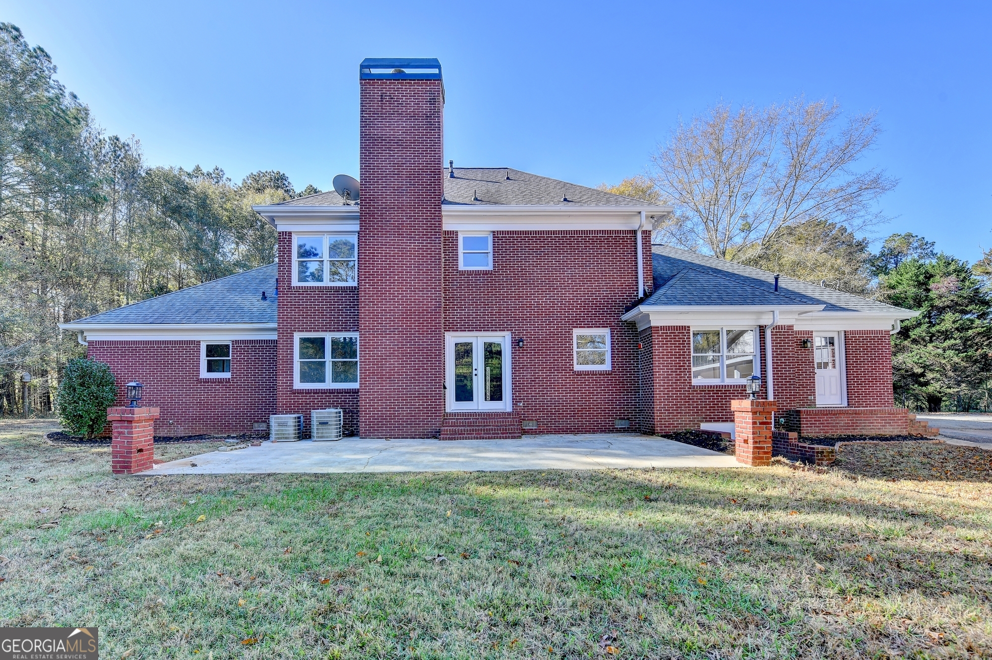 590 Manning Gin Road Monroe, GA 30656 - Photo 65 of 76 front view of a house with a yard
