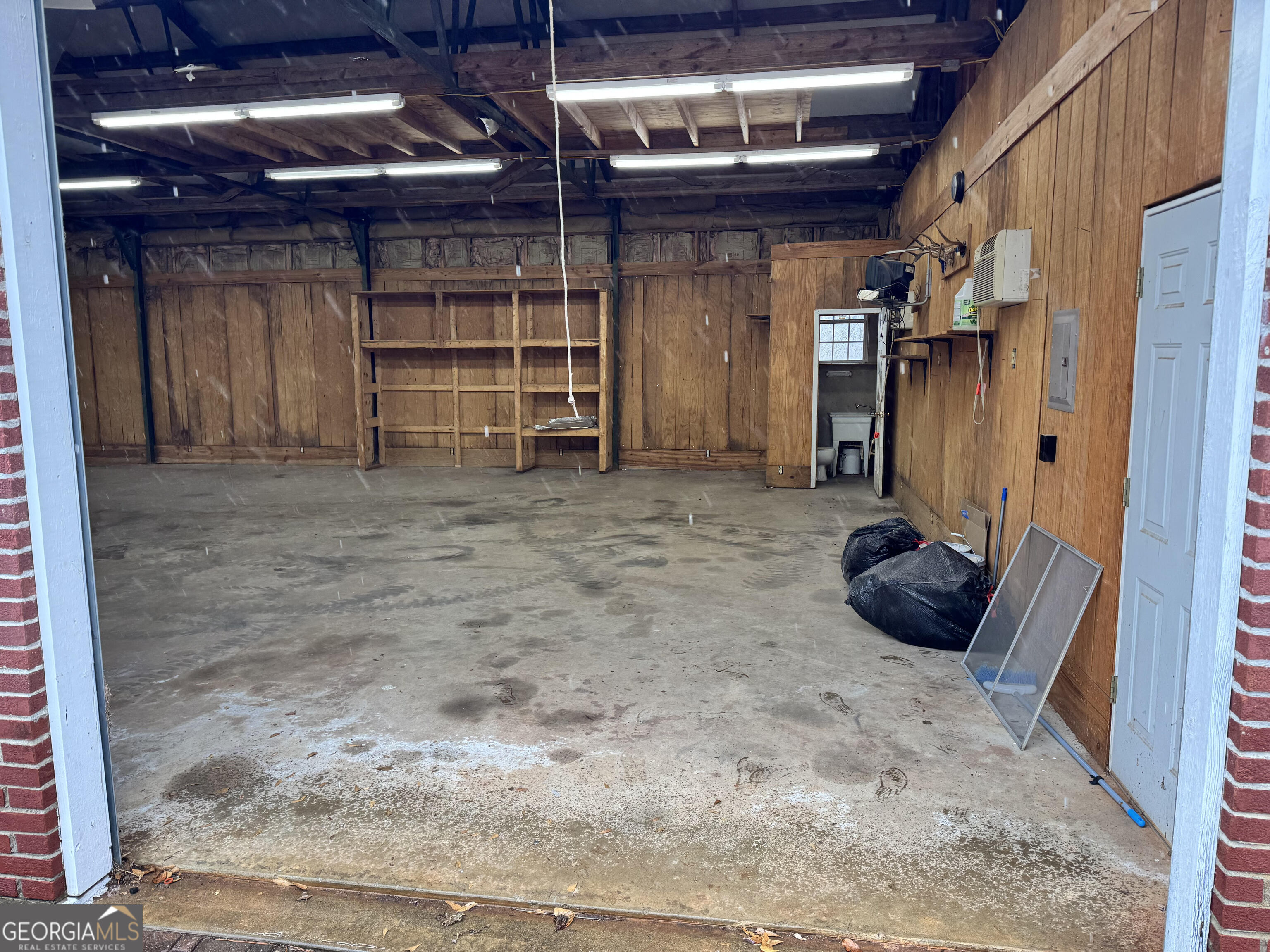 590 Manning Gin Road Monroe, GA 30656 - Photo 76 of 76 Inside 4 bay garage