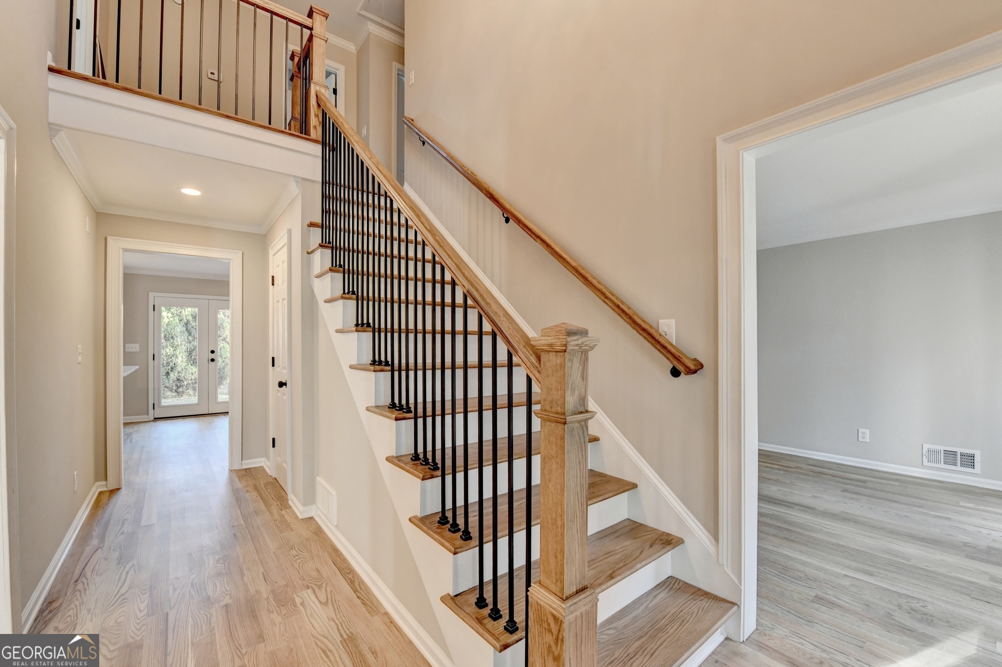 590 Manning Gin Road Monroe, GA 30656 - Photo 8 of 76 a view of a hallway with wooden floor and entryway