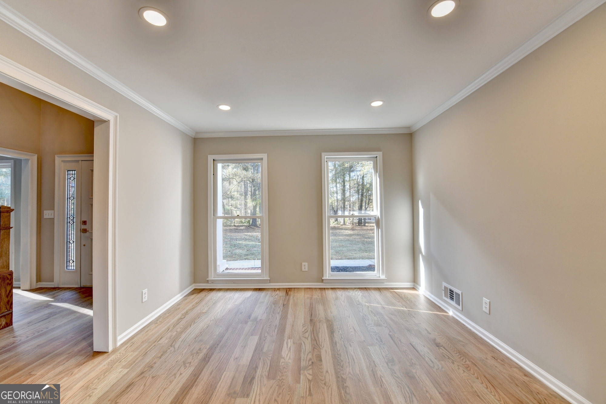 590 Manning Gin Road Monroe, GA 30656 - Photo 10 of 76 wooden floor in an empty room with window