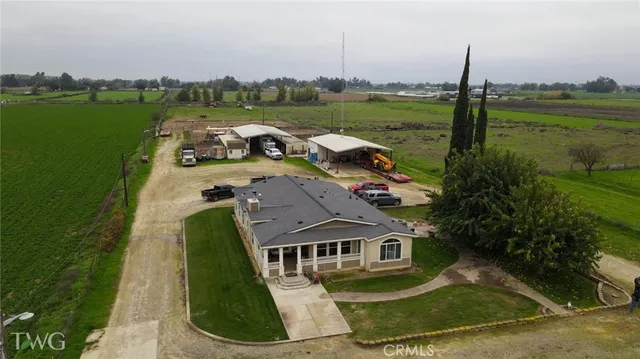 an aerial view of a house with a garden