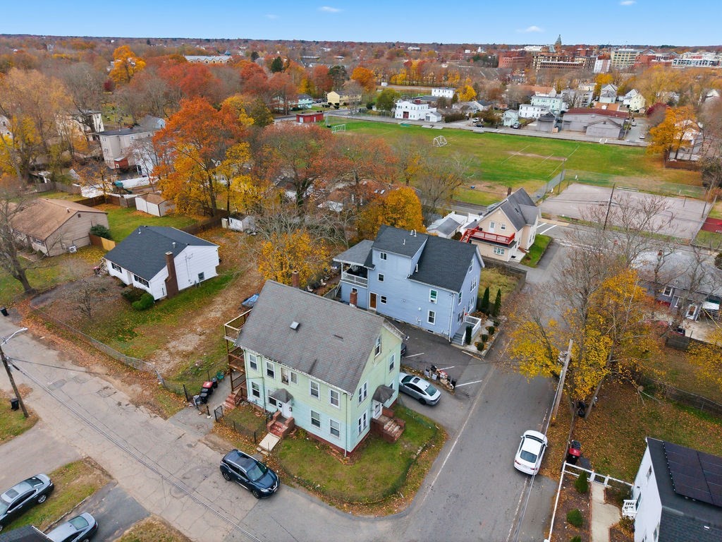 13 Standish Street Brockton, MA 02302 - Photo 4 of 8 an aerial view of a residential houses with outdoor space