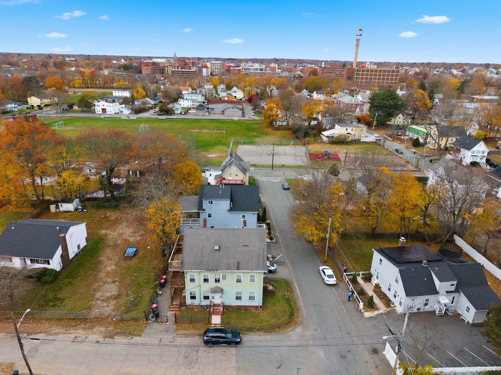 13 Standish Street Brockton, MA 02302 - Photo 5 of 8 an aerial view of residential houses with outdoor space
