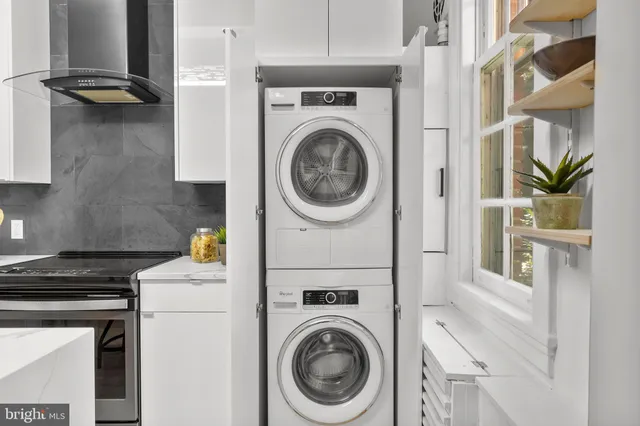 a utility room with dryer and washer