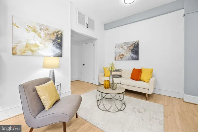 a living room with furniture and a couch