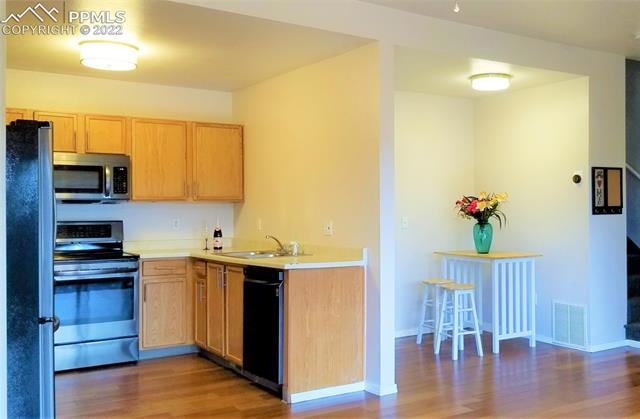 2002 Legacy Ridge View, Unit 104 Colorado Springs, CO 80910 - Photo 7 of 21 Opposite View Kitchen/Dining