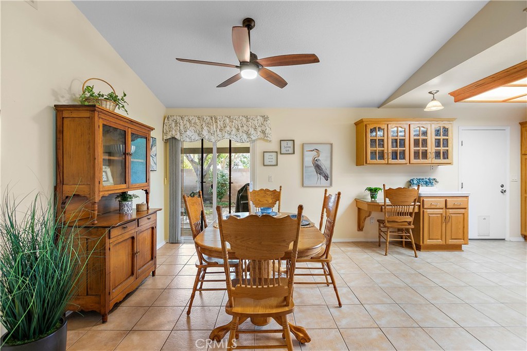 7241 Marine Avenue Rancho Cucamonga, CA 91701 - Photo 13 of 48 a dining room with furniture and window