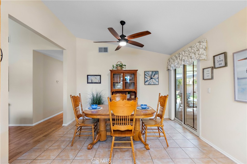7241 Marine Avenue Rancho Cucamonga, CA 91701 - Photo 16 of 48 a dining room with furniture and window