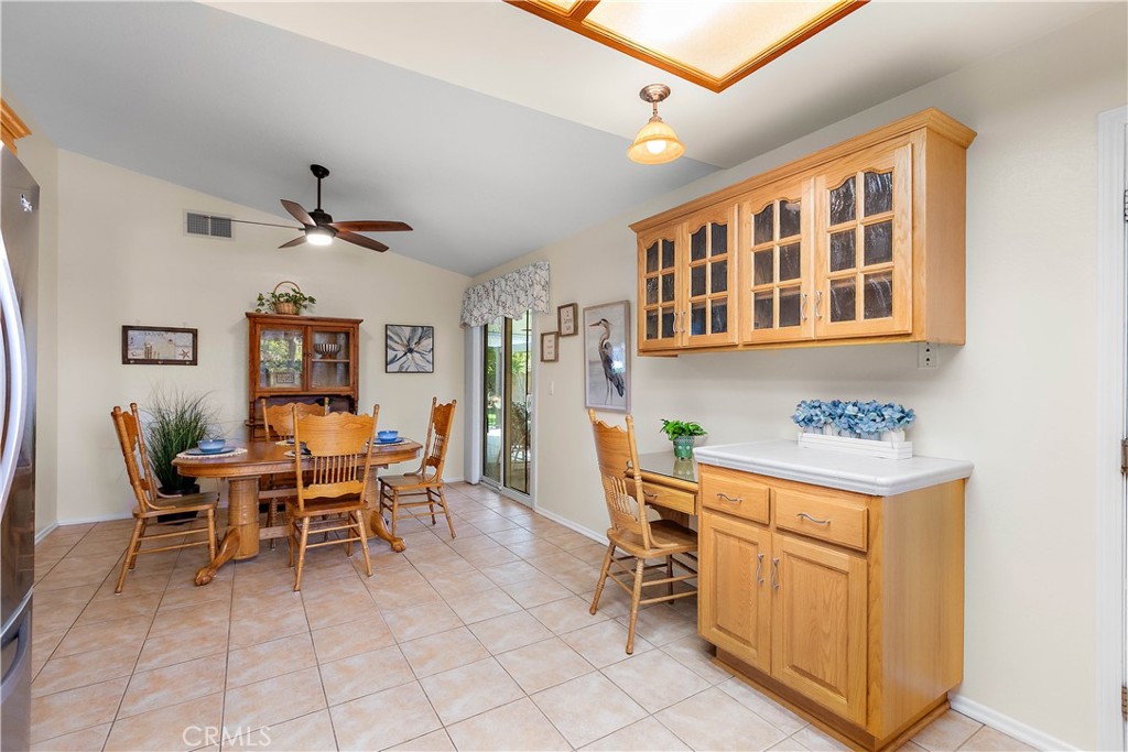 7241 Marine Avenue Rancho Cucamonga, CA 91701 - Photo 19 of 48 a dining room with furniture and entryway