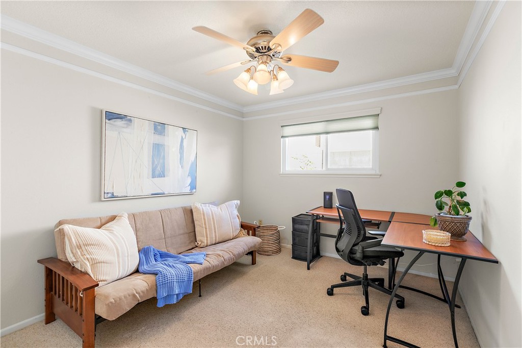 7241 Marine Avenue Rancho Cucamonga, CA 91701 - Photo 28 of 48 a living room with furniture and a chandelier