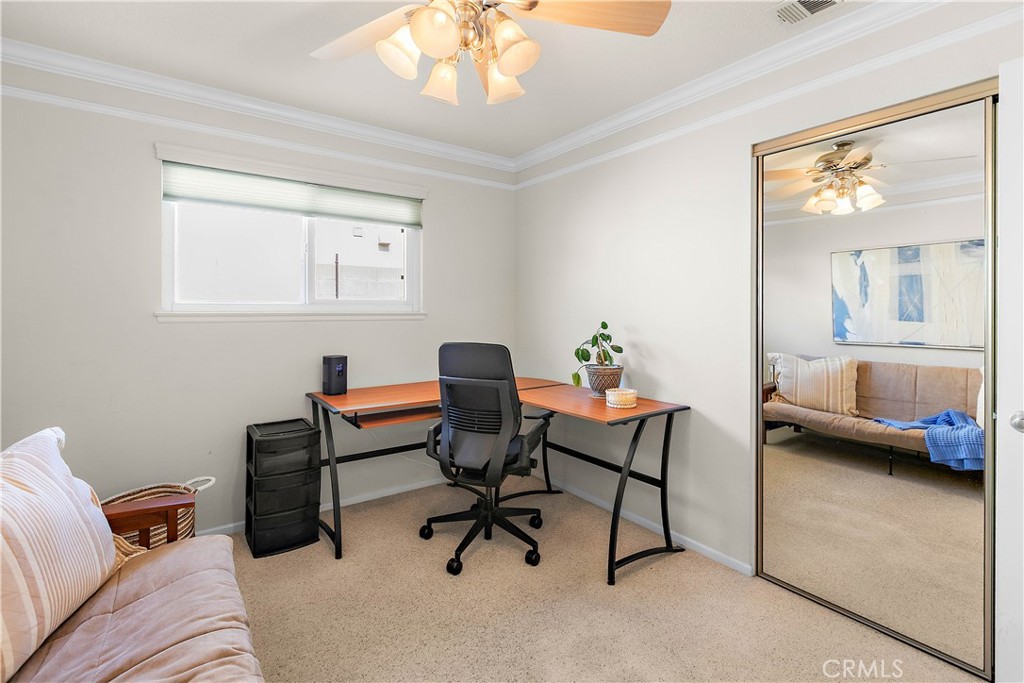 7241 Marine Avenue Rancho Cucamonga, CA 91701 - Photo 29 of 48 a view of a livingroom with workspace and a couch