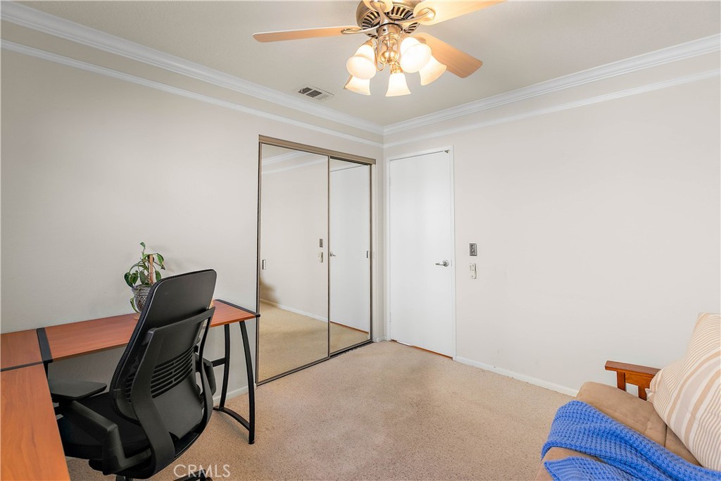 7241 Marine Avenue Rancho Cucamonga, CA 91701 - Photo 30 of 48 a view of a livingroom with furniture and chandelier fan