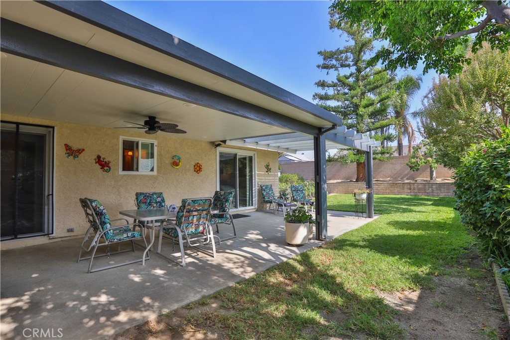 7241 Marine Avenue Rancho Cucamonga, CA 91701 - Photo 31 of 48 a view of a backyard with a patio and outdoor seating