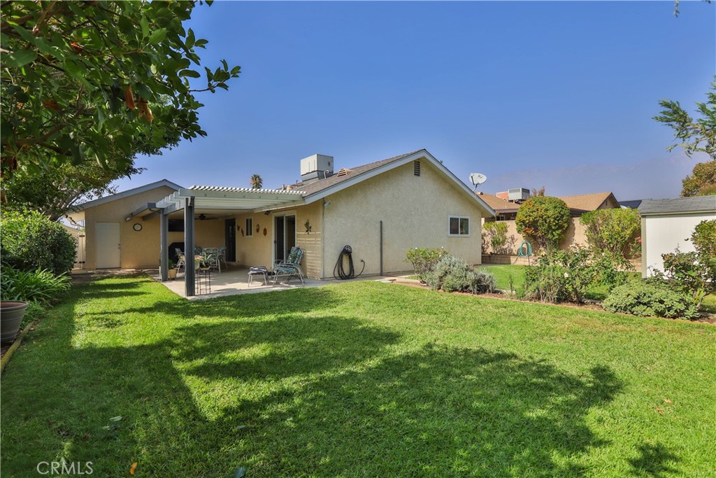 7241 Marine Avenue Rancho Cucamonga, CA 91701 - Photo 33 of 48 a view of a house with a yard and sitting area