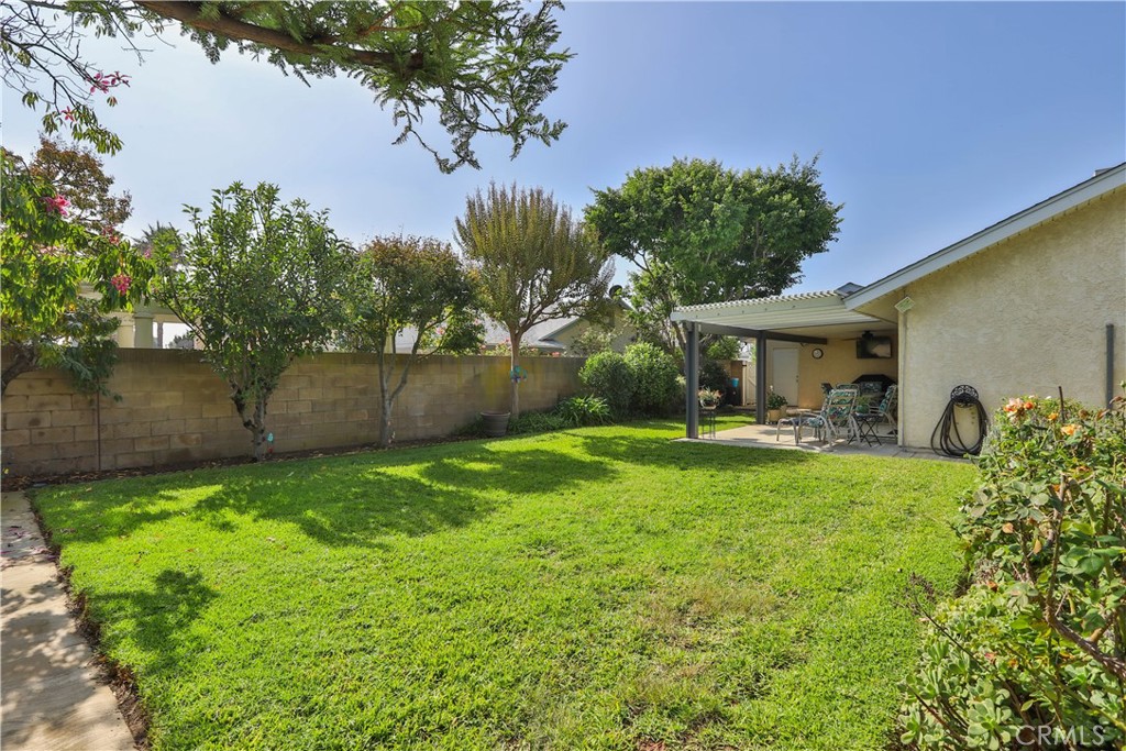 7241 Marine Avenue Rancho Cucamonga, CA 91701 - Photo 34 of 48 a front view of a house with garden