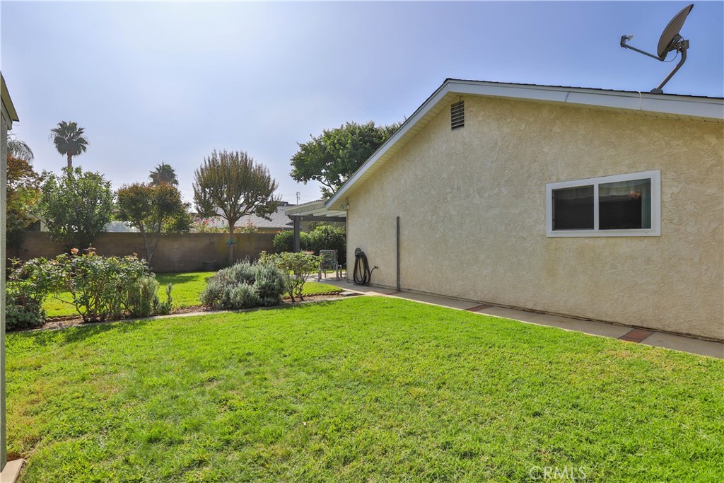 7241 Marine Avenue Rancho Cucamonga, CA 91701 - Photo 42 of 48 a view of a house with a yard