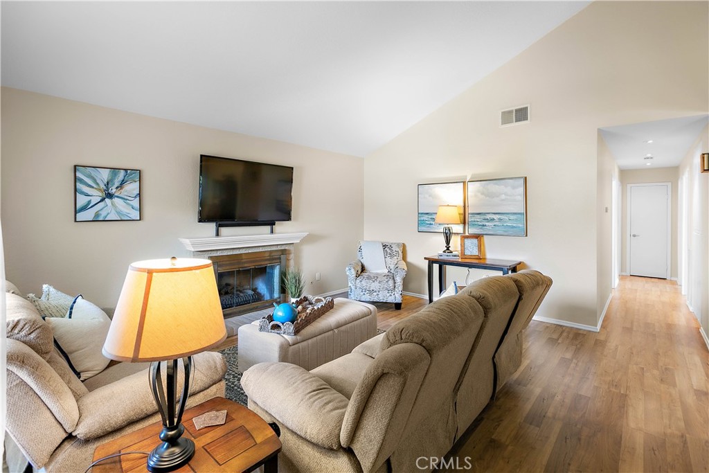 7241 Marine Avenue Rancho Cucamonga, CA 91701 - Photo 9 of 48 a living room with furniture and a flat screen tv