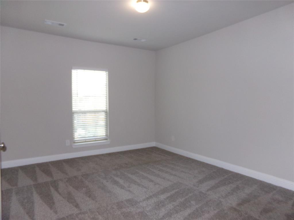 1748 Redding Street Allen, TX 75002 - Photo 11 of 33 an empty room with a window
