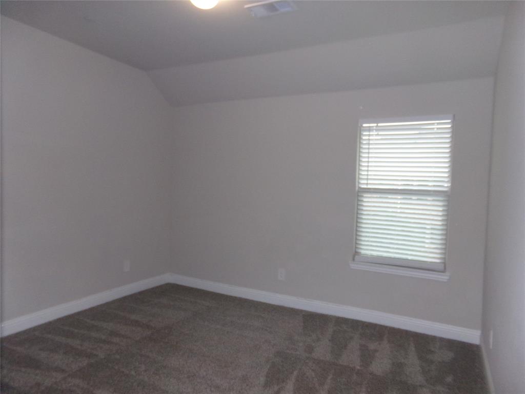 1748 Redding Street Allen, TX 75002 - Photo 22 of 33 an empty room with a window