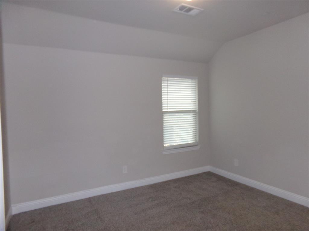 1748 Redding Street Allen, TX 75002 - Photo 23 of 33 an empty room with a window