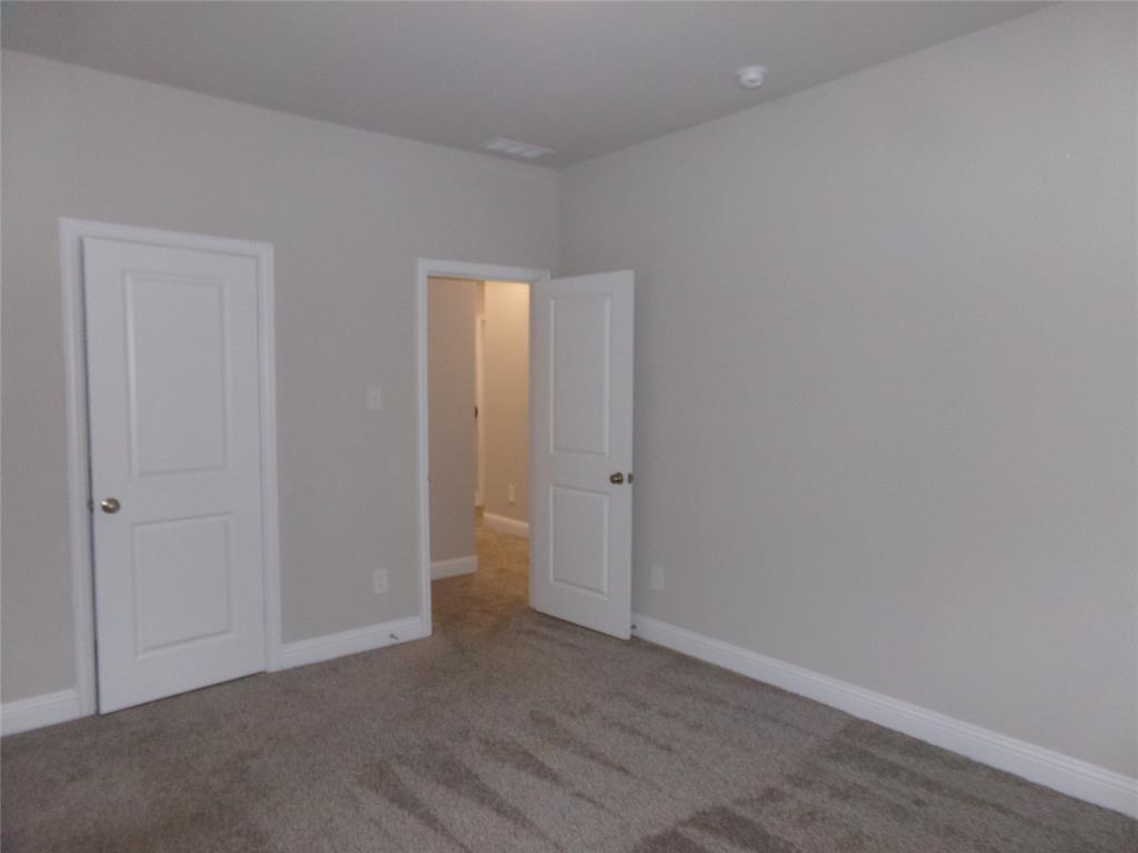 1748 Redding Street Allen, TX 75002 - Photo 26 of 33 Unfurnished bedroom featuring carpet flooring and baseboards