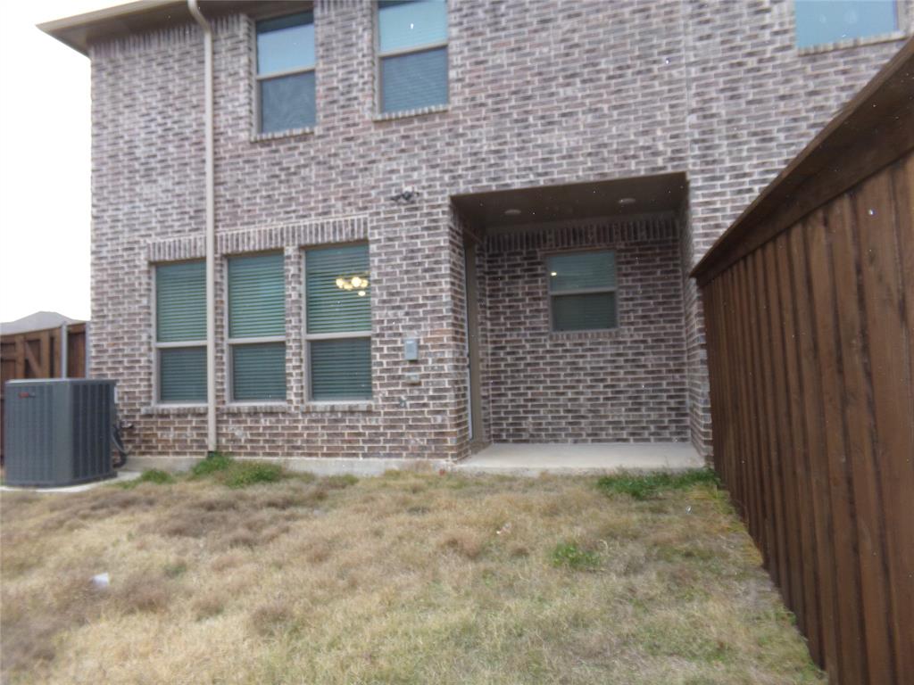 1748 Redding Street Allen, TX 75002 - Photo 30 of 33 a front view of a house with a garden