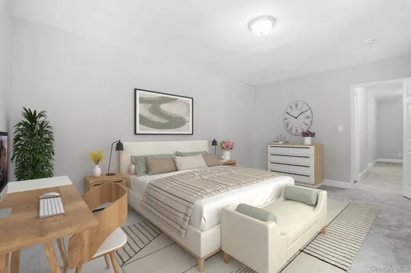 a bedroom with a bed and lamp