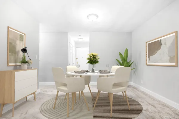 a view of a dining room with furniture