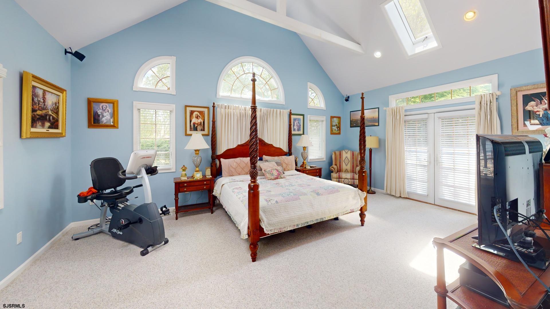 228 Marlin Road Absecon, NJ 08201 - Photo 14 of 24 a bedroom with bed and tv