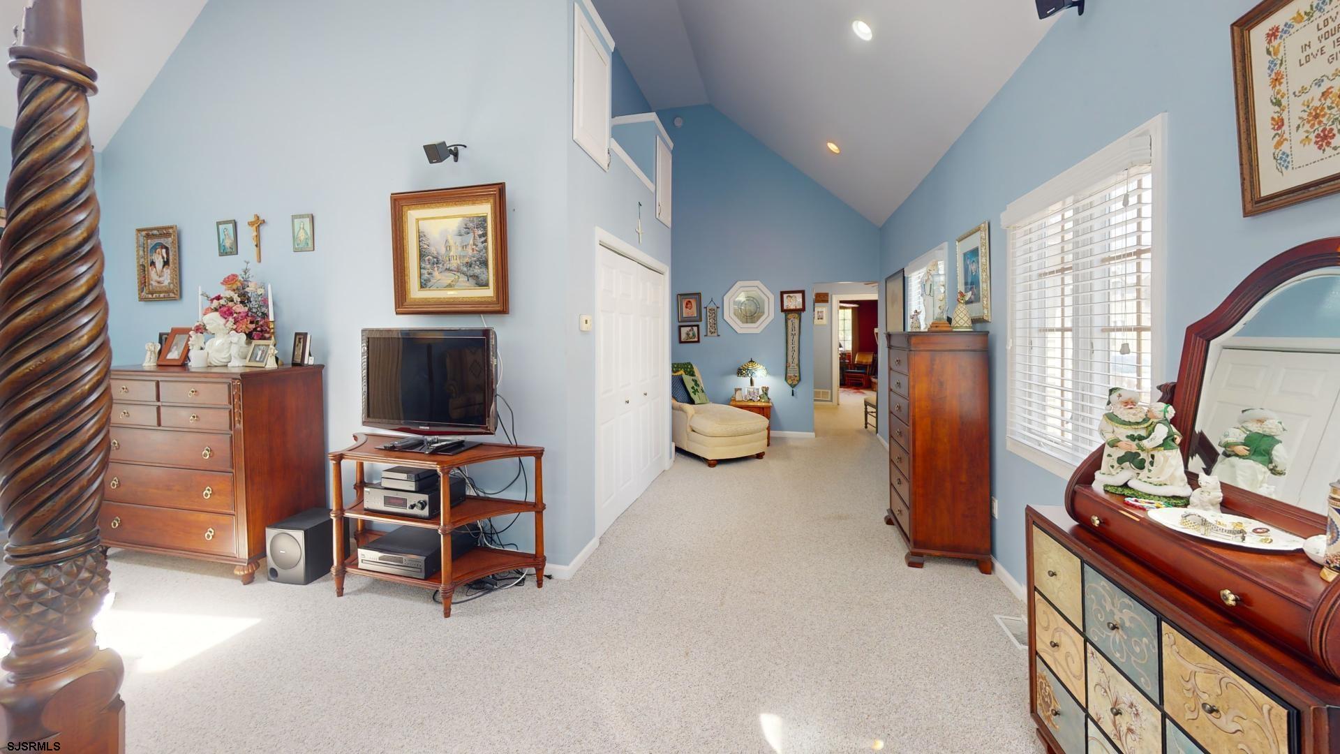 228 Marlin Road Absecon, NJ 08201 - Photo 15 of 24 a living room with furniture and a flat screen tv