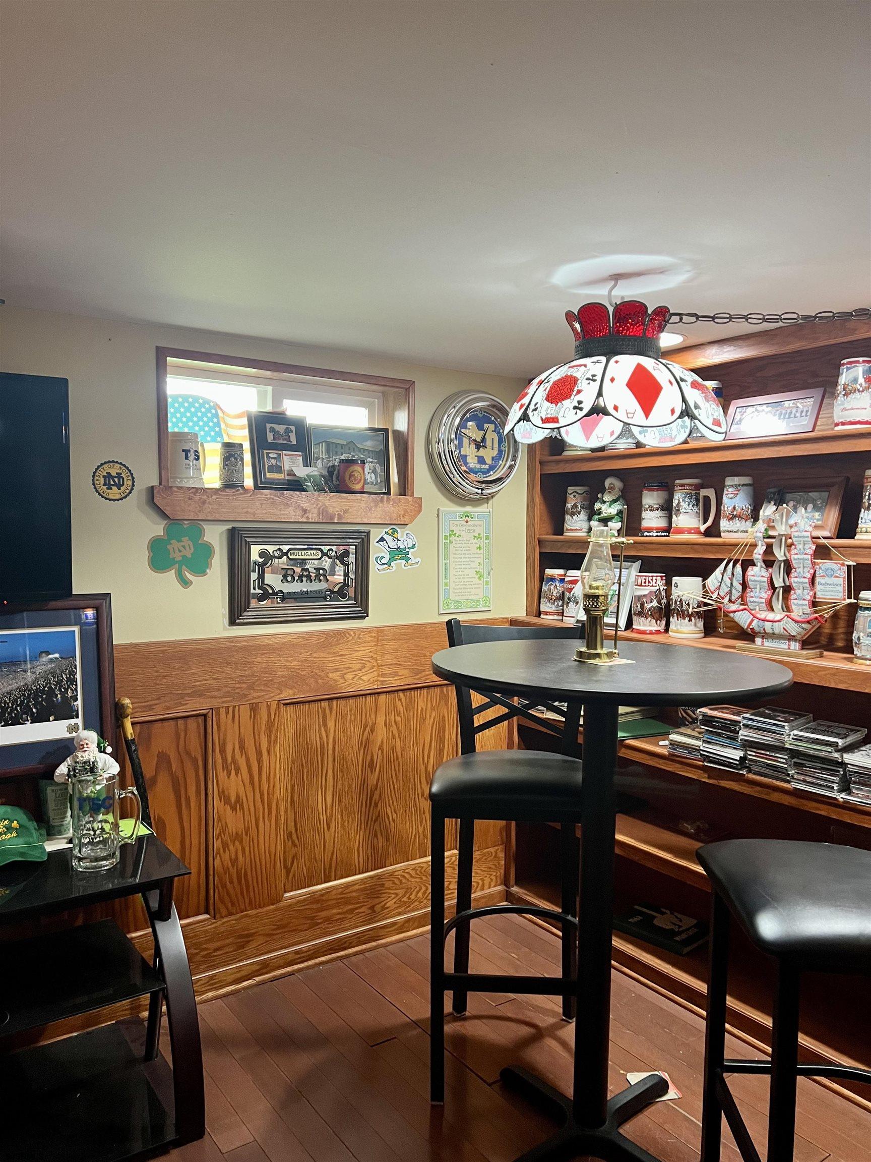 228 Marlin Road Absecon, NJ 08201 - Photo 20 of 24 a room with stainless steel appliances kitchen island a table and chairs