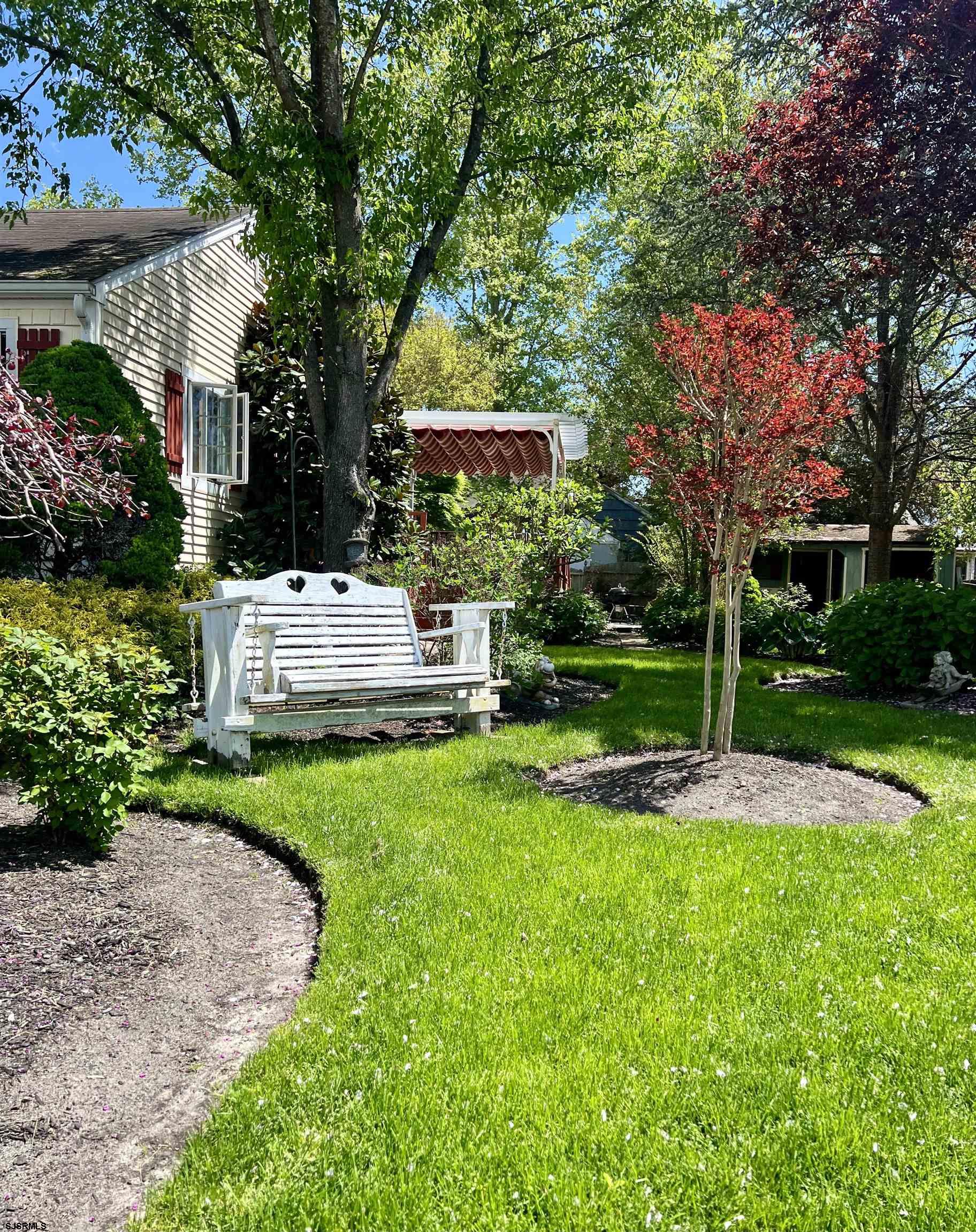 228 Marlin Road Absecon, NJ 08201 - Photo 23 of 24 a garden view with a seating space
