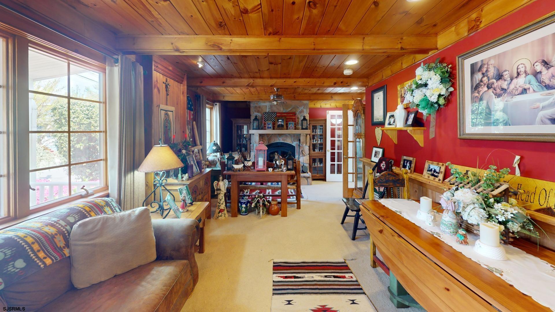 228 Marlin Road Absecon, NJ 08201 - Photo 3 of 24 a outdoor living space with furniture and a fireplace