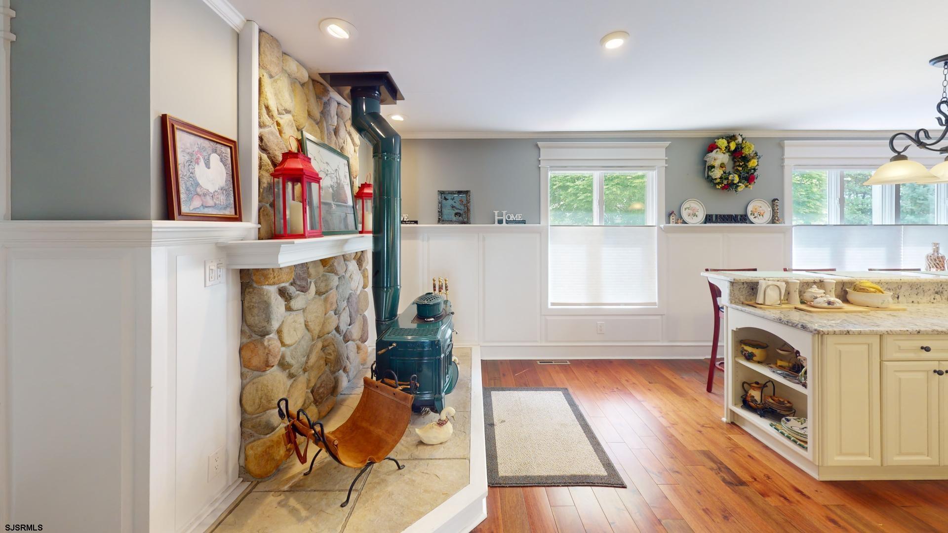 228 Marlin Road Absecon, NJ 08201 - Photo 6 of 24 a living room with furniture and a fireplace
